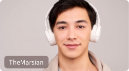 A student on a zoom or video call looking into the camera